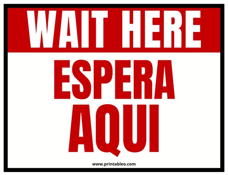 Wait Here In Spanish Sign