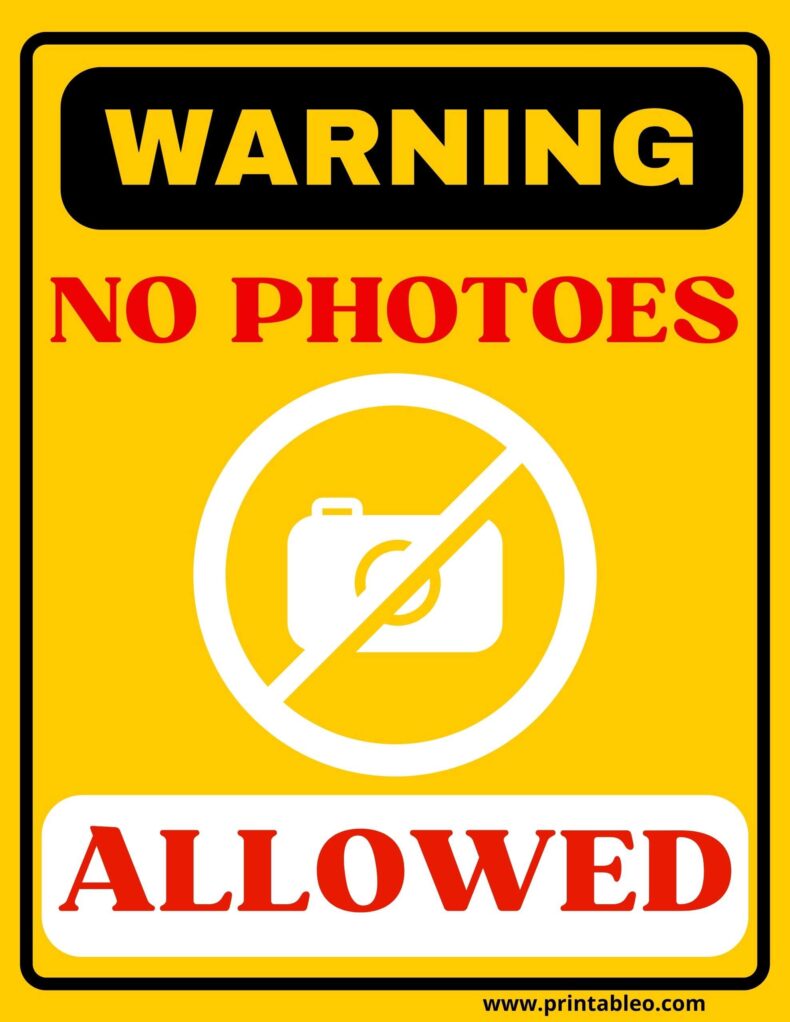 No Photoes Allowed Sign